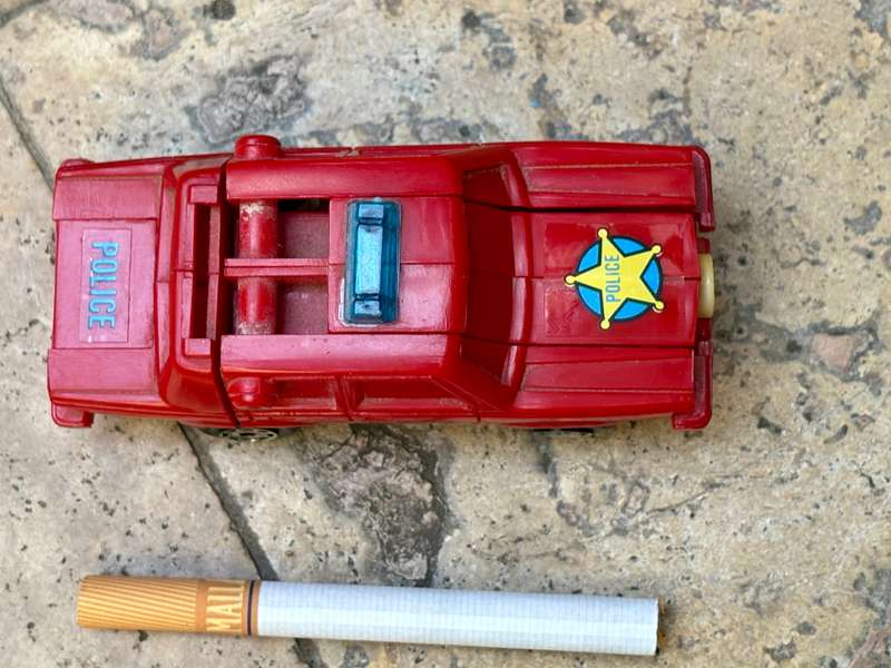 Vintage esso robot racer transforming police car pvc Hong Kong  1984