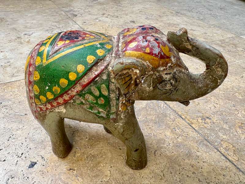 Hand carved wooden elephant trunk up statue figure