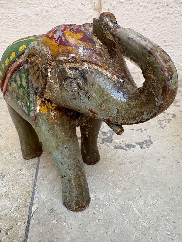 Hand carved wooden elephant trunk up statue figure