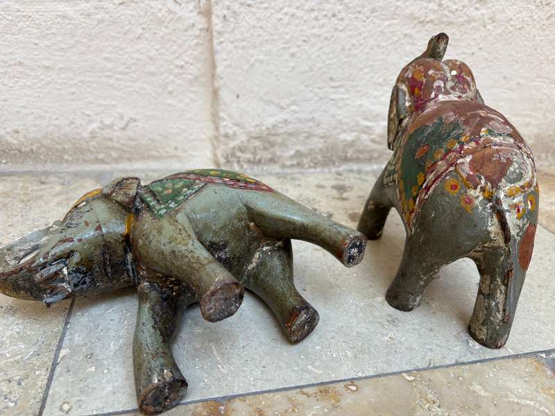 Hand carved wooden elephant trunk up statue figure
