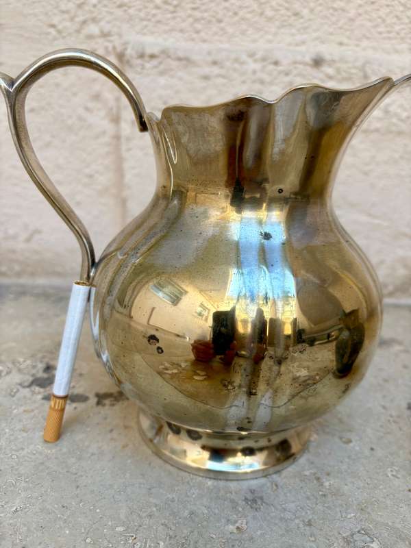 Vintage heavy brass pitcher small and large pair