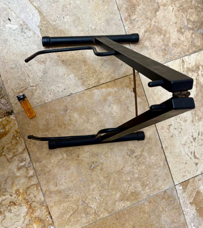 Fold away guitar stand