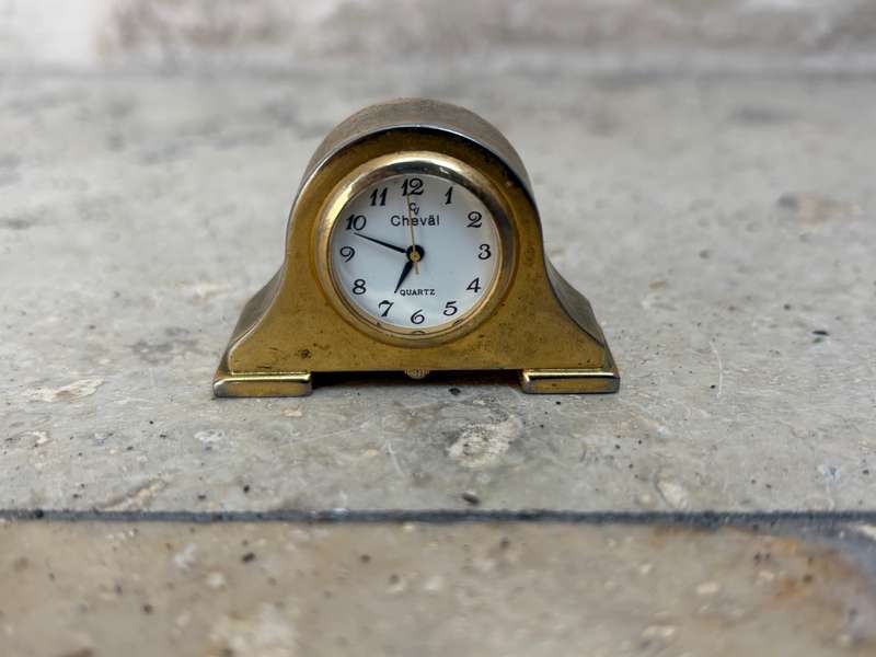 Miniature brass tone quartz cheval mantle clock and B Japan made mantle clock pair