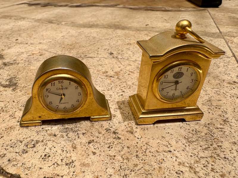 Miniature brass tone quartz cheval mantle clock and B Japan made mantle clock pair