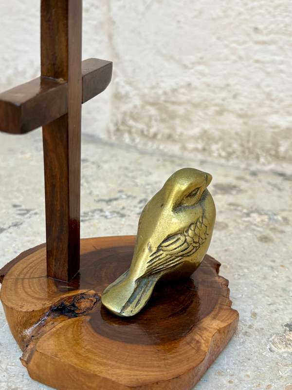 Brass sparrow on wood crucifix pedestal