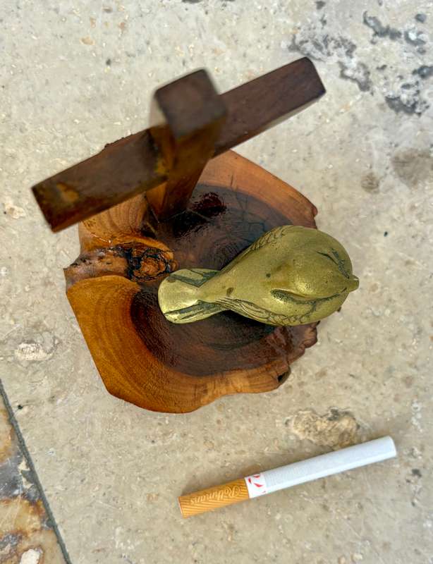 Brass sparrow on wood crucifix pedestal