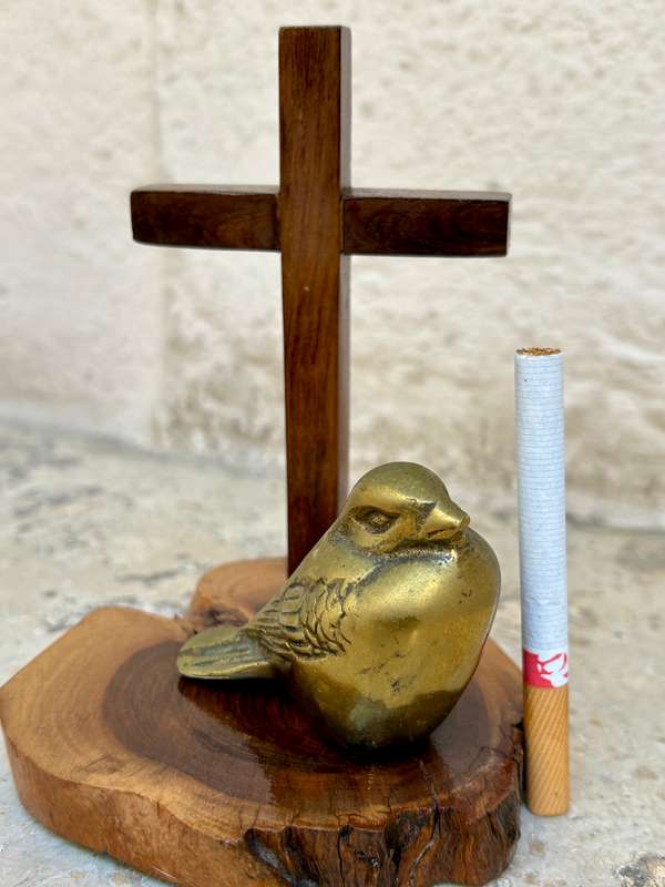 Brass sparrow on wood crucifix pedestal