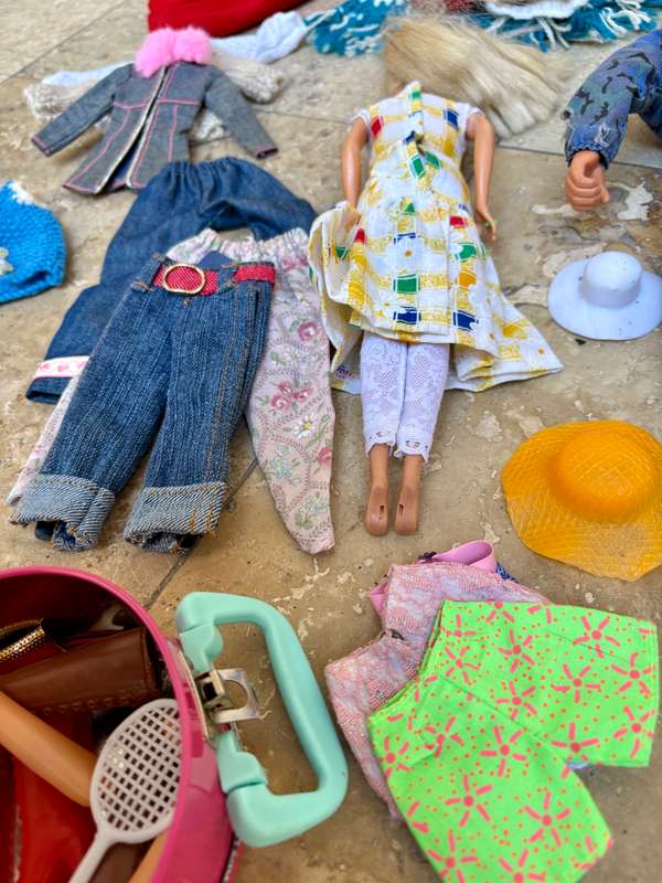 Vintage Barbie and Ken doll pair with extra clothes lot