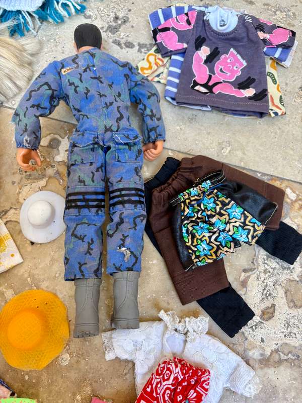 Vintage Barbie and Ken doll pair with extra clothes lot