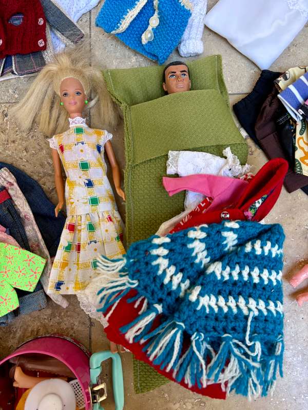 Vintage Barbie and Ken doll pair with extra clothes lot