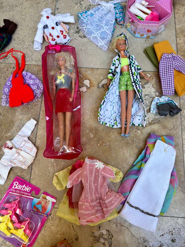 Vintage Barbie doll pair with lots of clothes