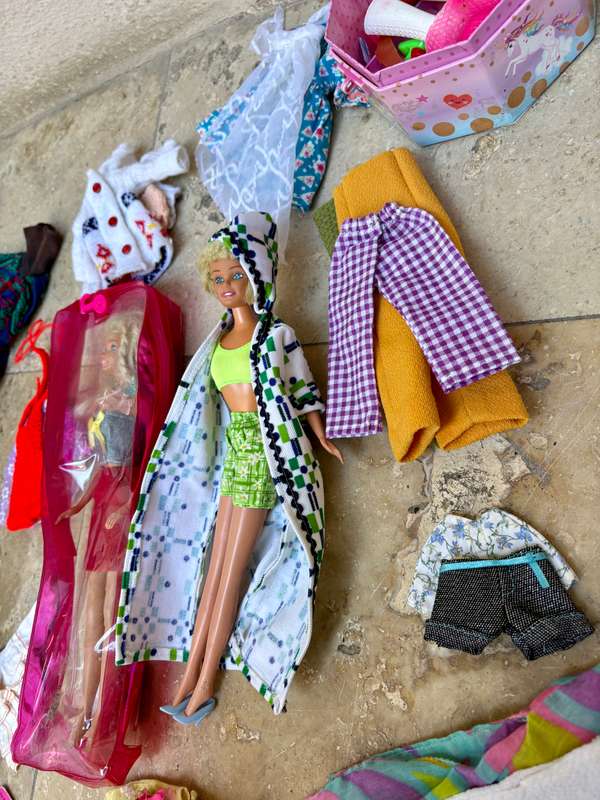 Vintage Barbie doll pair with lots of clothes