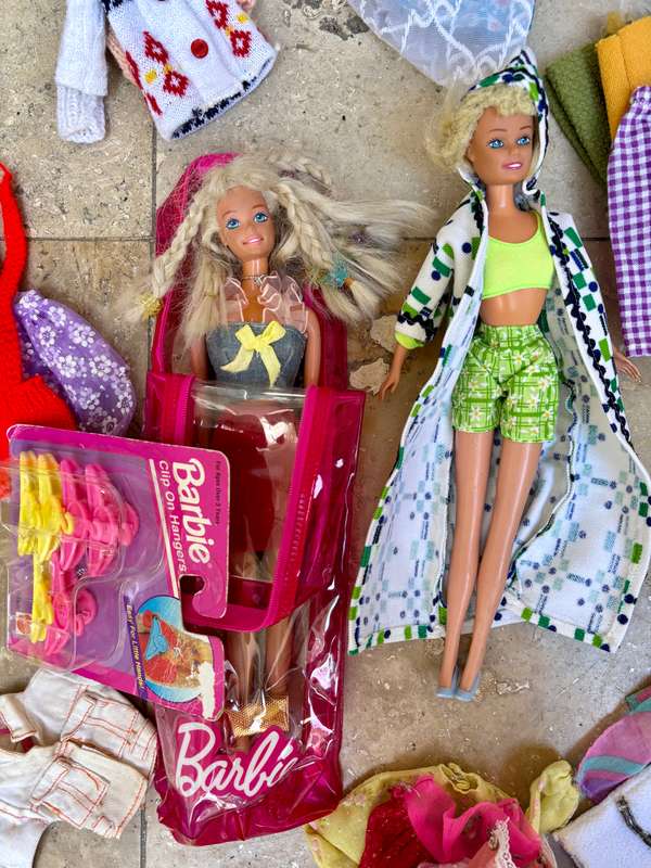 Vintage Barbie doll pair with lots of clothes