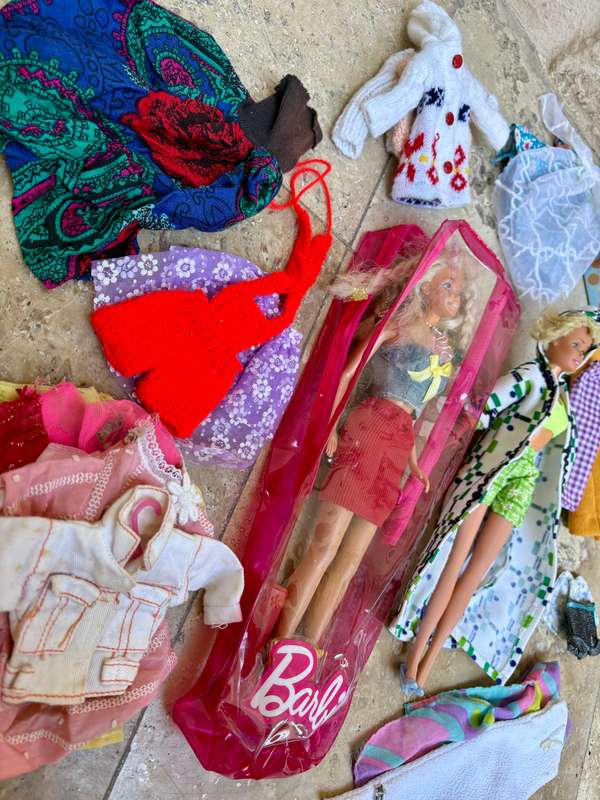 Vintage Barbie doll pair with lots of clothes