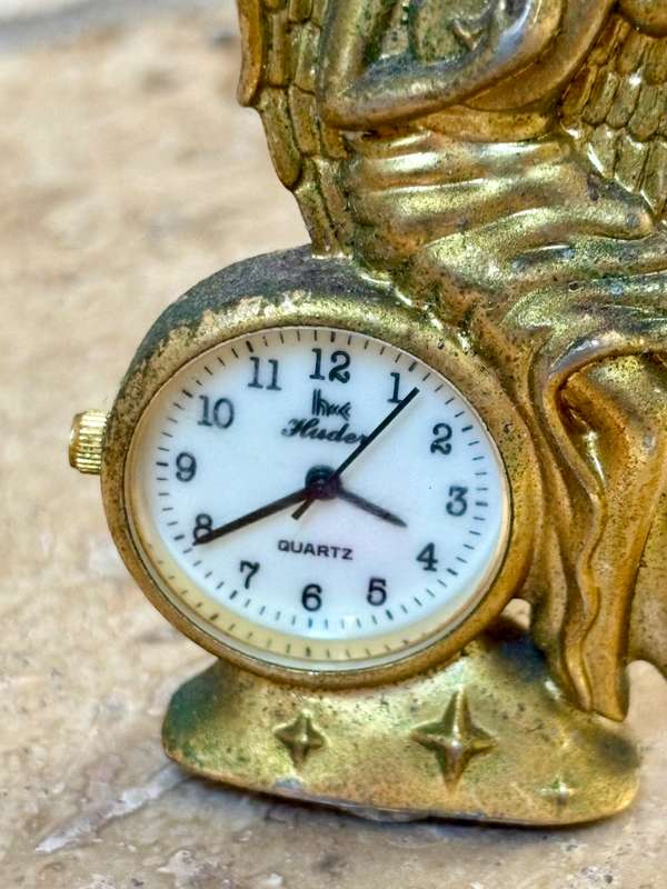 Vintage miniature quartz clock brass angel playing banjo