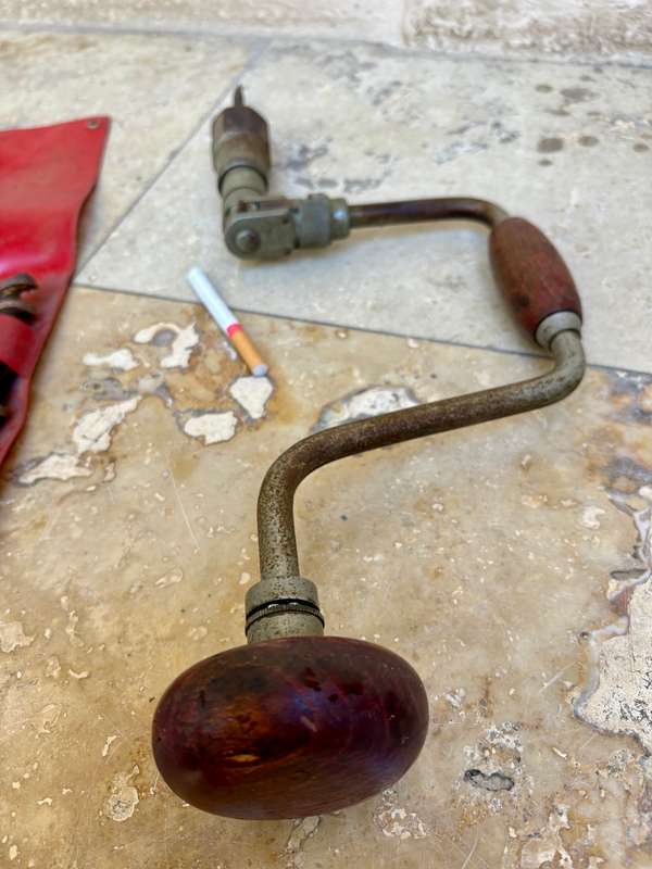 Vintage hand drill with drill bits
