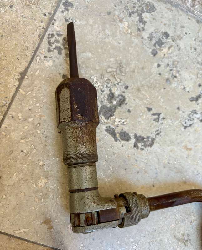 Vintage hand drill with drill bits