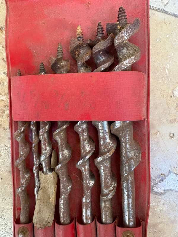 Vintage hand drill with drill bits