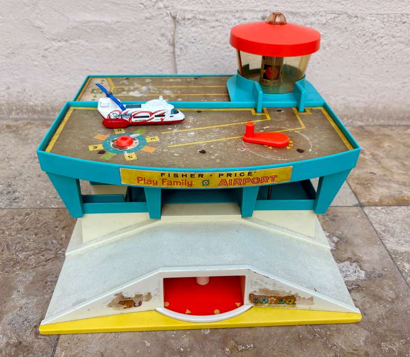 Vintage fisher price airport with old diecast transporter helicopter tlc