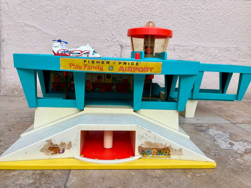Vintage fisher price airport with old diecast transporter helicopter tlc