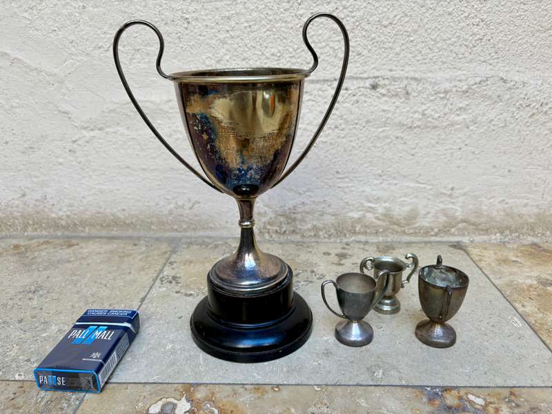 Vintage trophy large with 3 small trophies