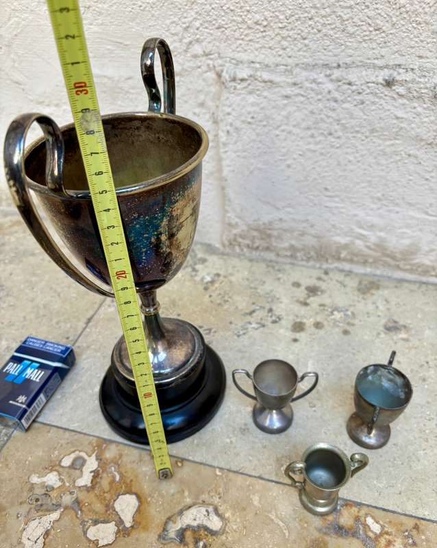 Vintage trophy large with 3 small trophies