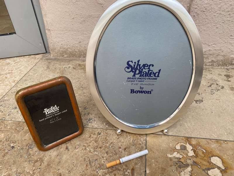 Oval silver plated picture frame by Bowon with small brass frame