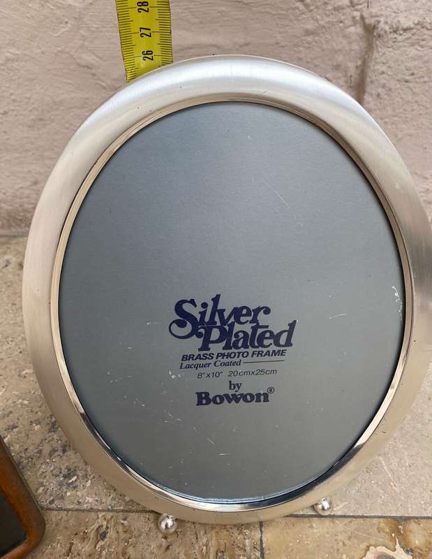 Oval silver plated picture frame by Bowon with small brass frame