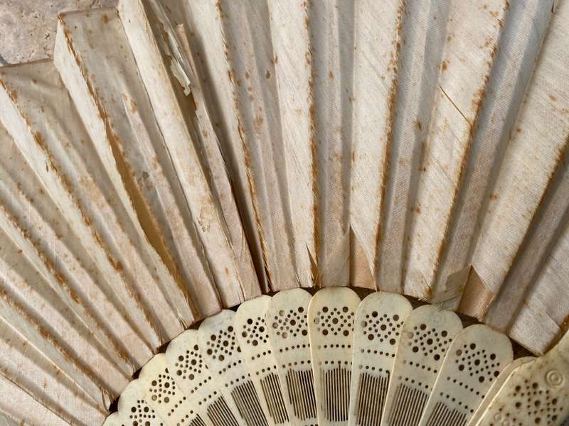 Antique hand fan carved bone and paper tlc , sold as spares