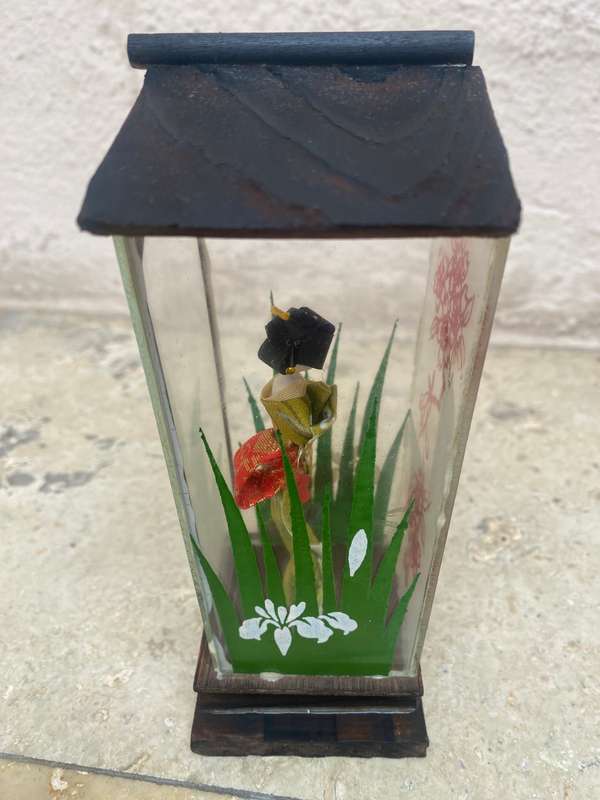 Vintage geisha doll in Perspex glass case with wooden roof