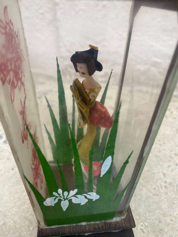 Vintage geisha doll in Perspex glass case with wooden roof