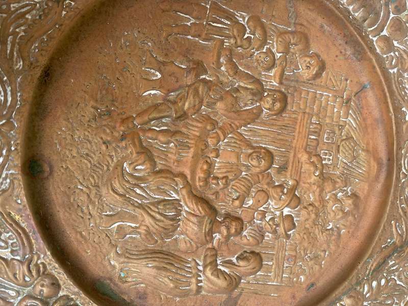 Embossed brass wall plaque 36cm