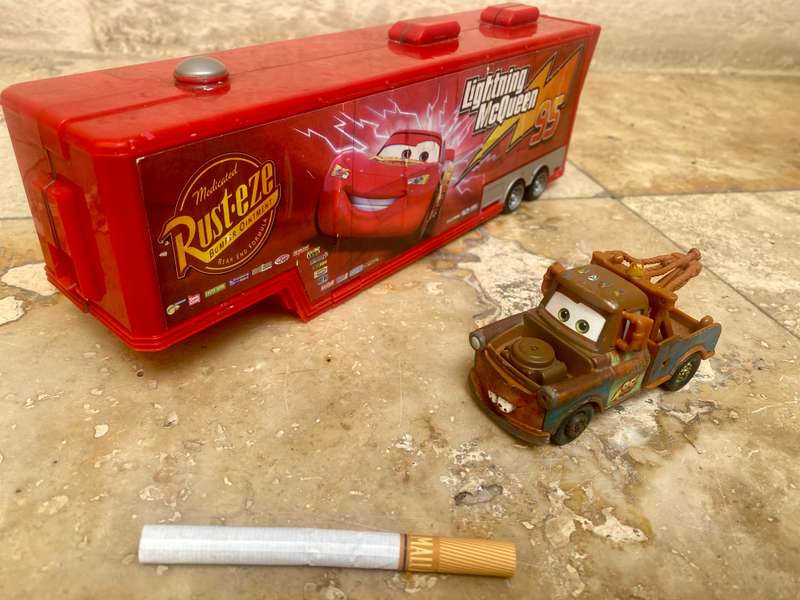Disney Pixar lightning McQueen transforming trailer with one car Playset