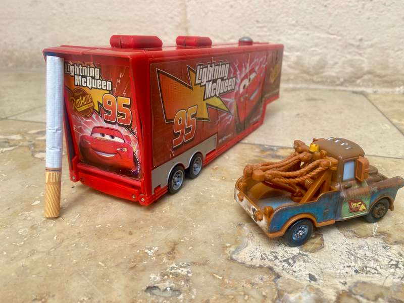 Disney Pixar lightning McQueen transforming trailer with one car Playset