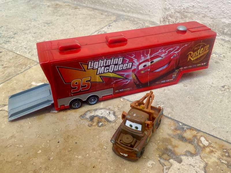Disney Pixar lightning McQueen transforming trailer with one car Playset