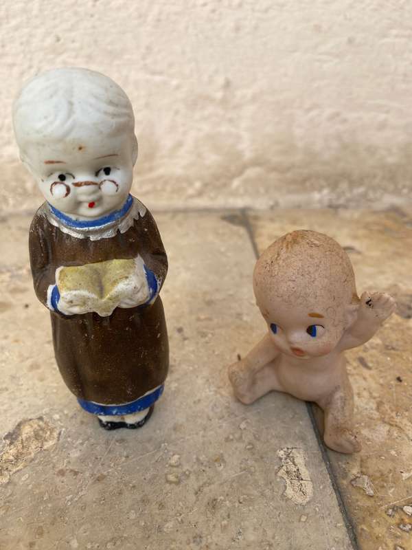 Antique Japan Bisque doll figurine pair kewpie baby and child reading figure