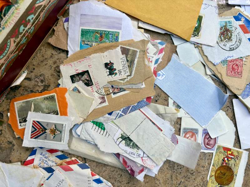 Large lot of stamps in cigar box stamp lot