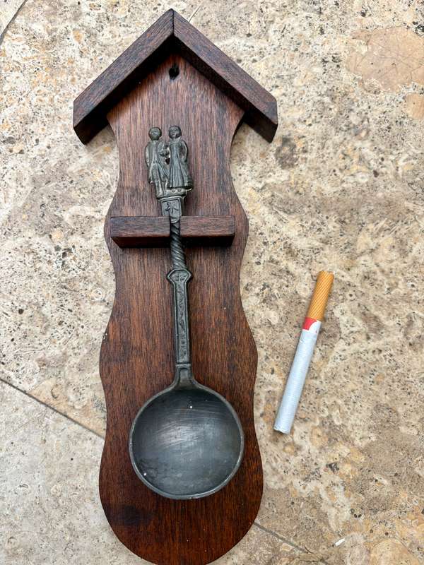 Pewter spoon decorative on wood wall mount