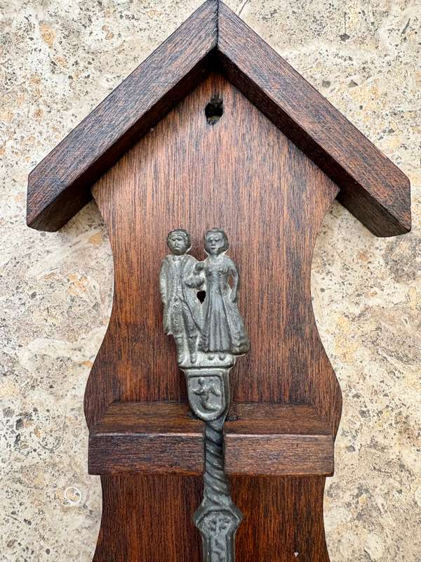 Pewter spoon decorative on wood wall mount