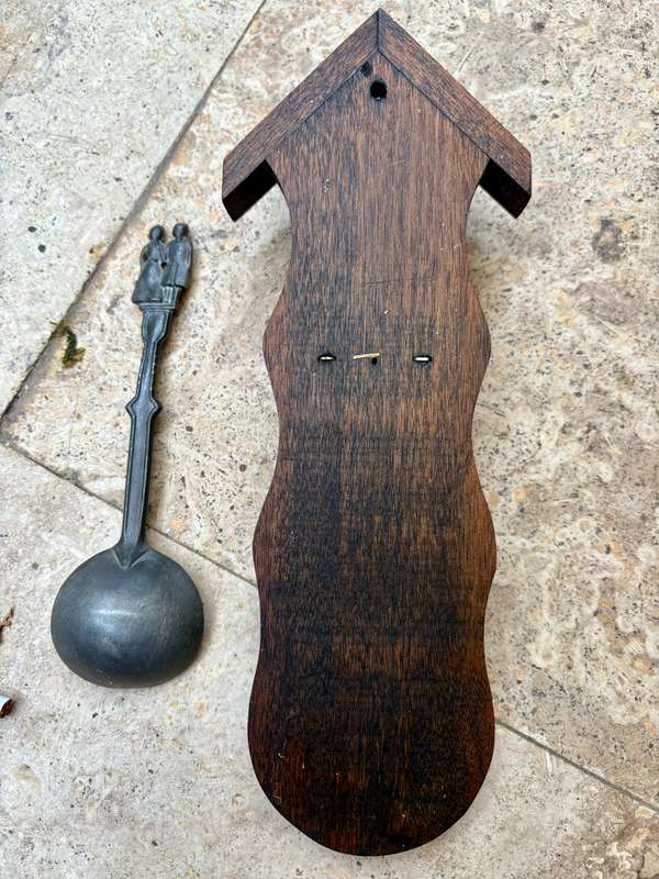 Pewter spoon decorative on wood wall mount