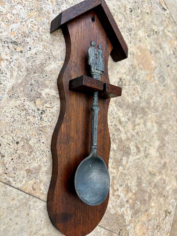 Pewter spoon decorative on wood wall mount