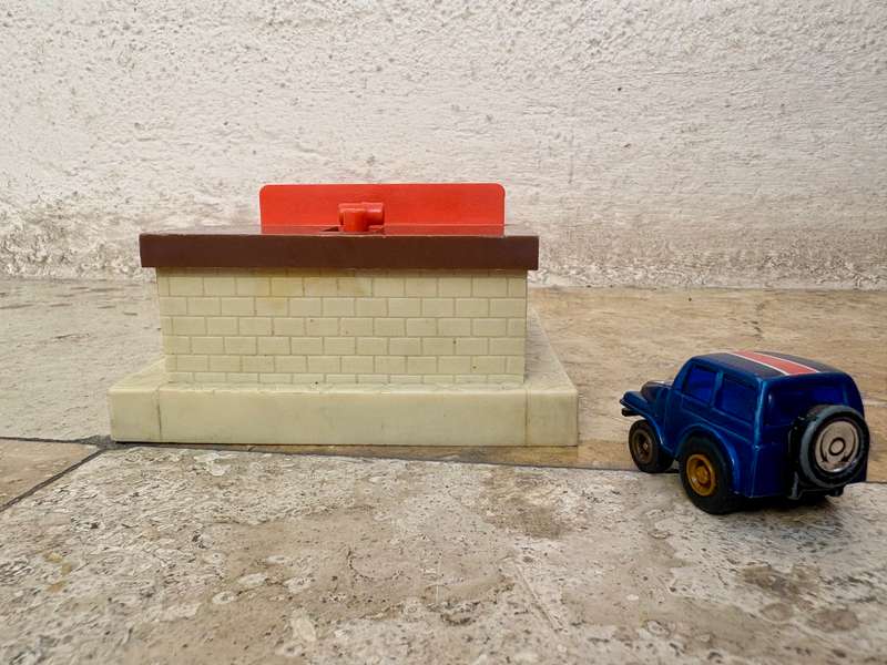 Vintage road champs mini garage with Golden eagle car