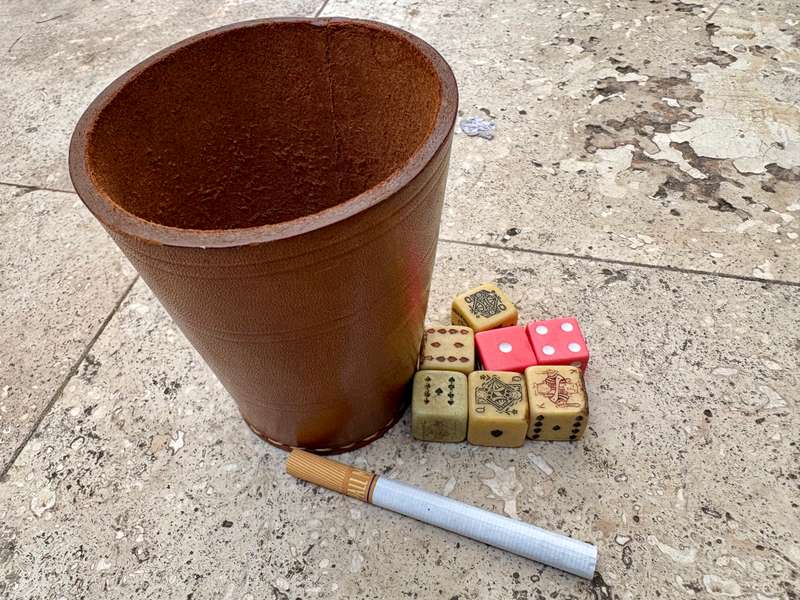 Vintage leather dice cup with dice and  Bakelite poker dice
