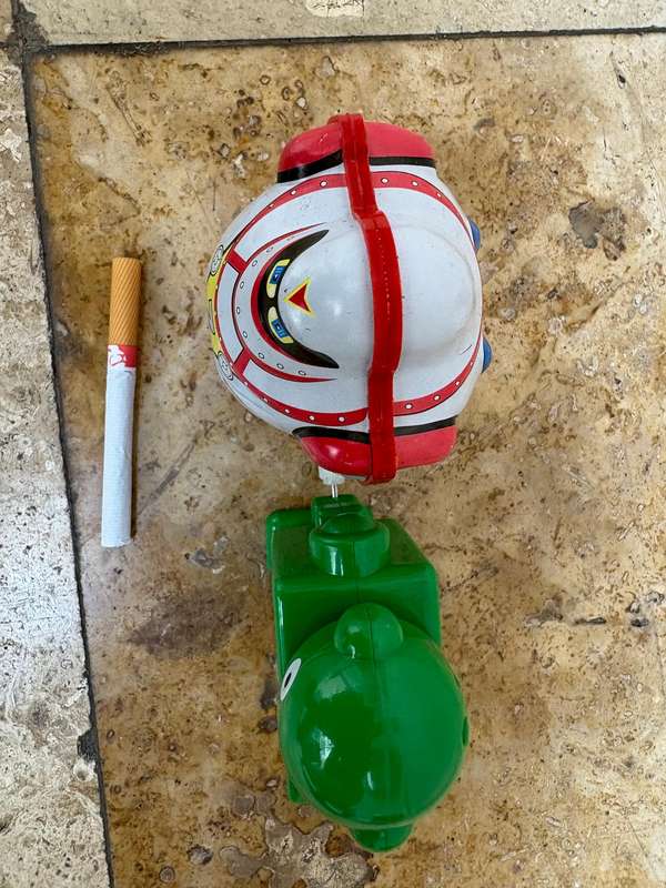 Retro tin Schylling Rowley wind up tin robot , pvc green wind up robot pair
