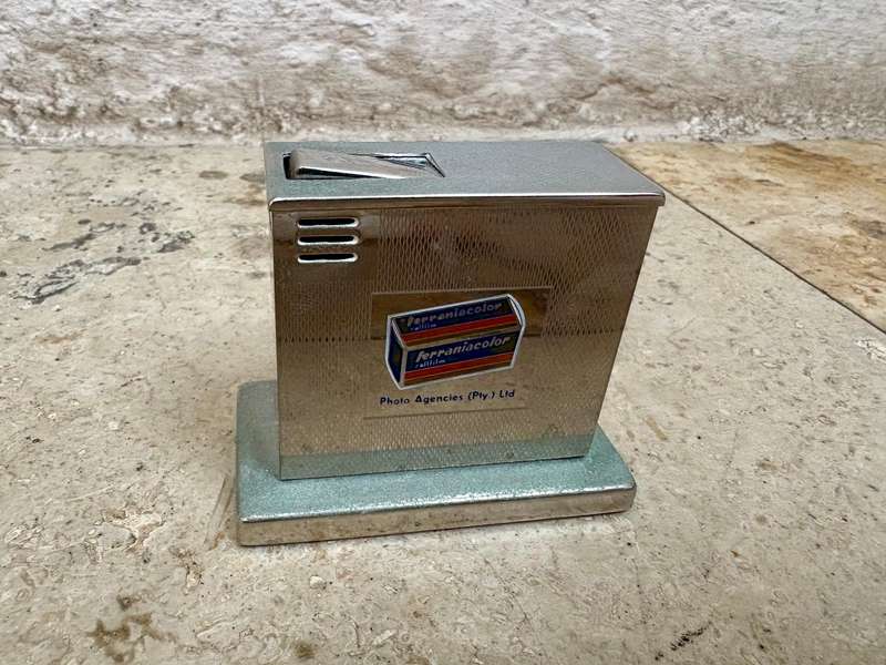 Vintage Augusta table lighter West Germany advertising Ferraniacolor film