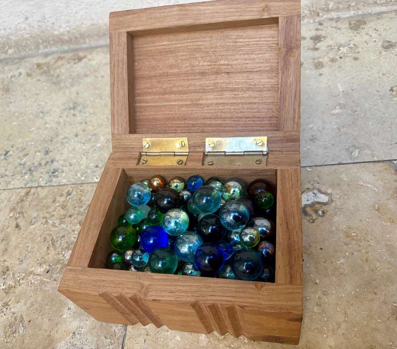 Vintage exotic Wood carved box filled with vintage soda marbles