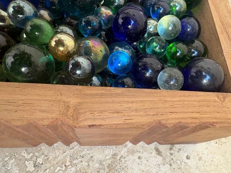 Vintage exotic Wood carved box filled with vintage soda marbles