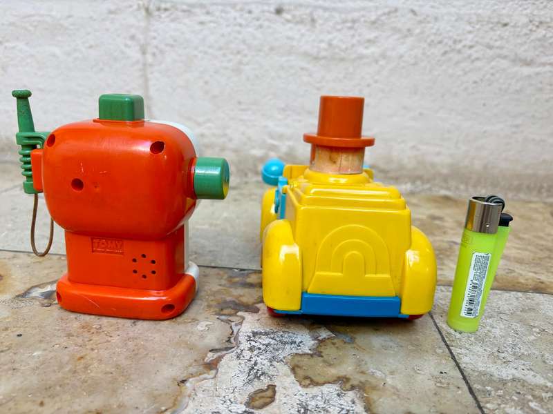 Vintage Tomy push and go car + ring a ding fuel pump 1985