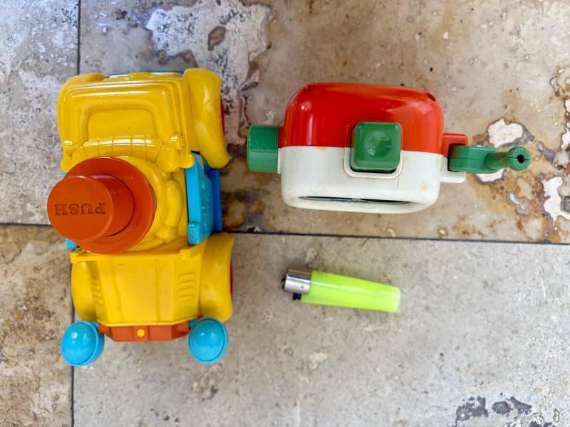 Vintage Tomy push and go car + ring a ding fuel pump 1985