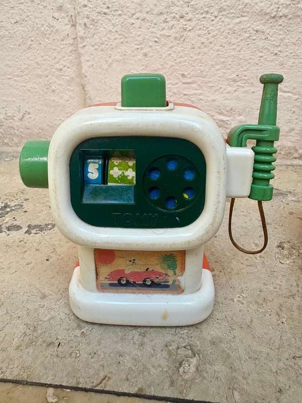 Vintage Tomy push and go car + ring a ding fuel pump 1985